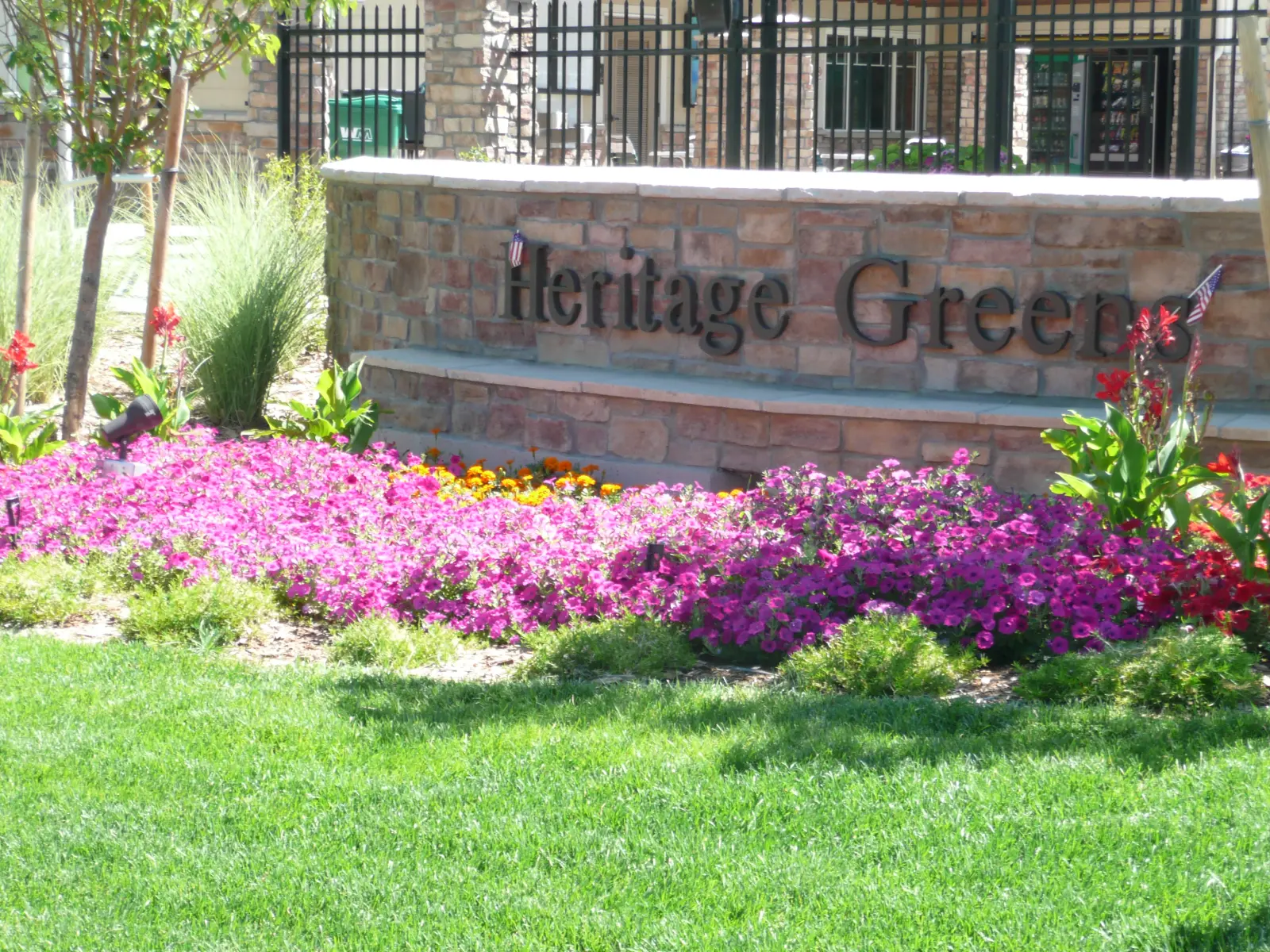 HOA entrance landscaping maintained by JLS in Denver