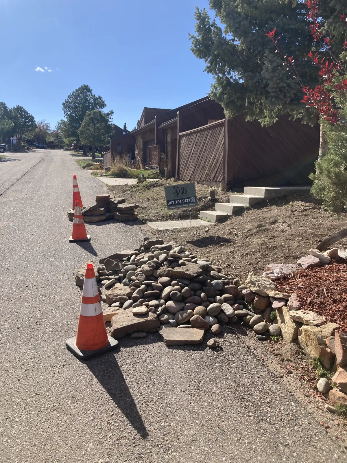 Mulch and rock bed installation by JLS Landscape