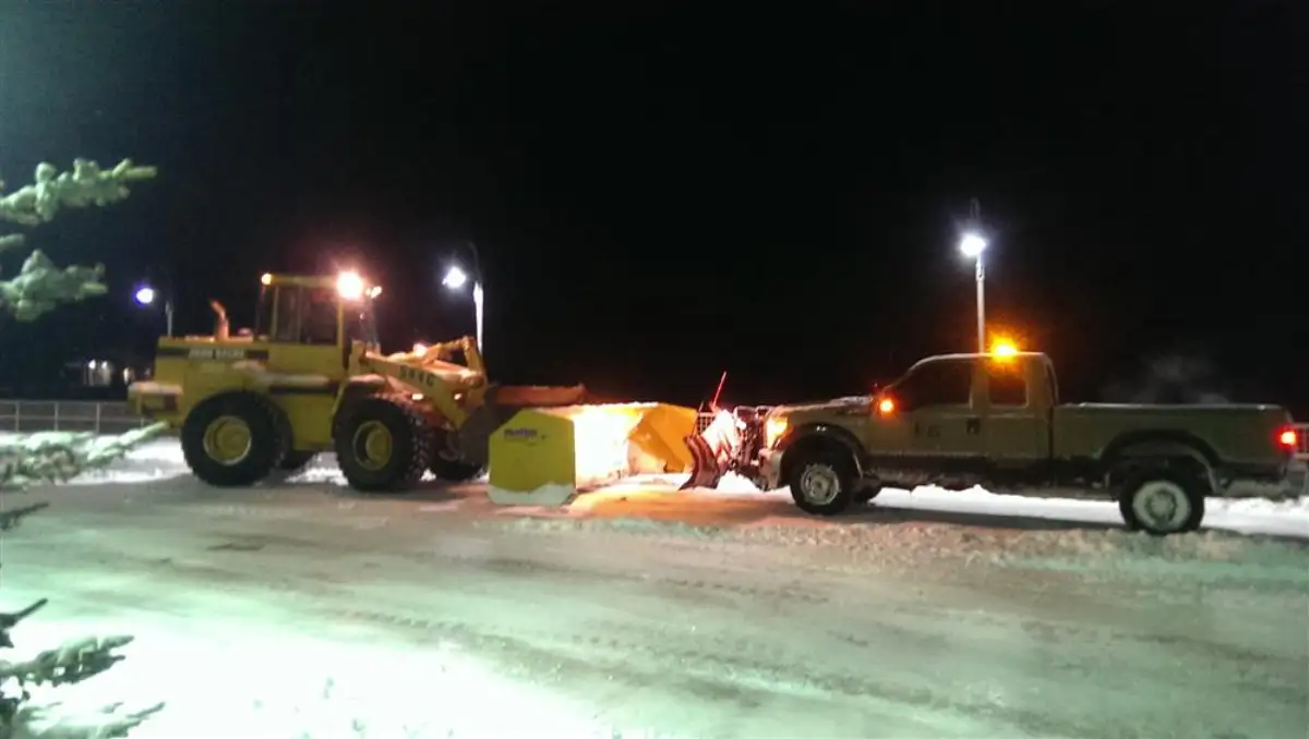 JLS loader and plow truck during a Denver snow event