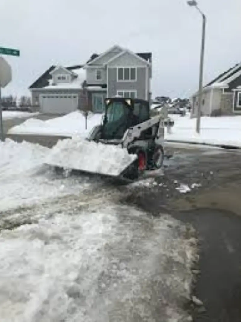 Snow removal equipment working during a Colorado winter storm